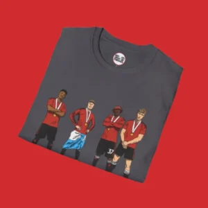 Close-up of charcoal T-shirt with detailed animated images of Manchester United’s FA Cup stars Amad, Garnacho, Mainoo, and Hojlund.