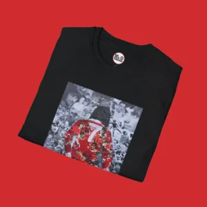 Close-up of the George Best collage T-shirt showing detailed black-and-white images of the football legend.