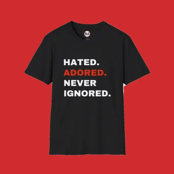 Full-length image of the black "HATED. ADORED. NEVER IGNORED." T-shirt by Red Devil Threads, inspired by Manchester United fans.